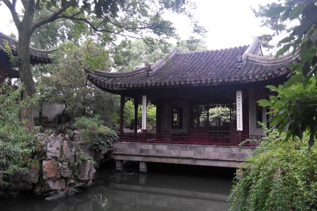 A classical garden pavilion over water in Suzhou, China