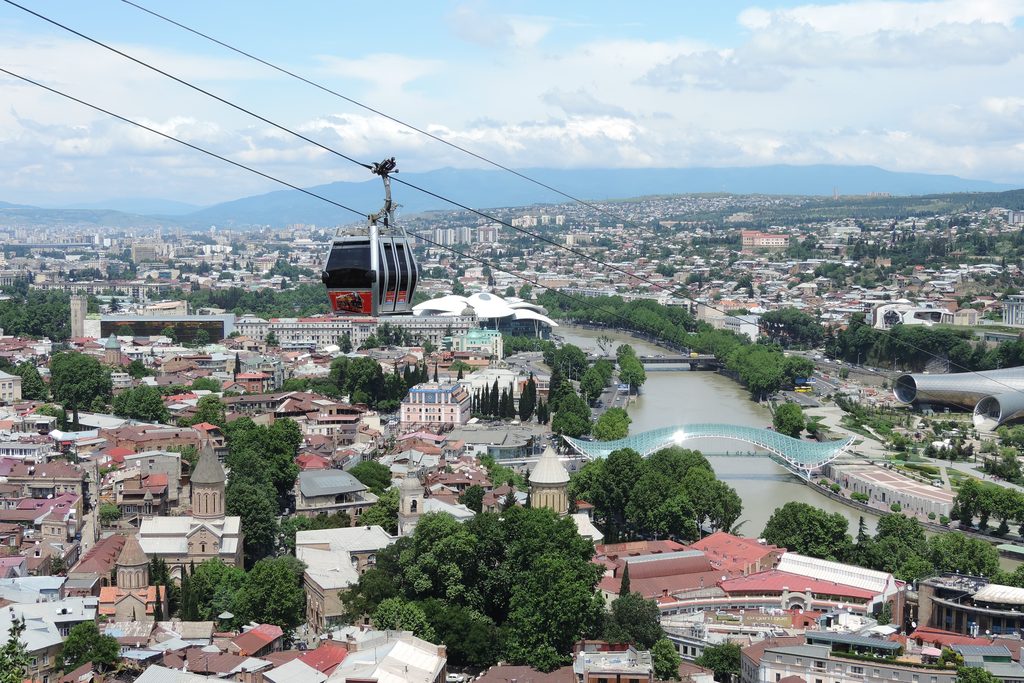 Panoramic view over the rooftops of Tbilisi toward Sameba Cathedral